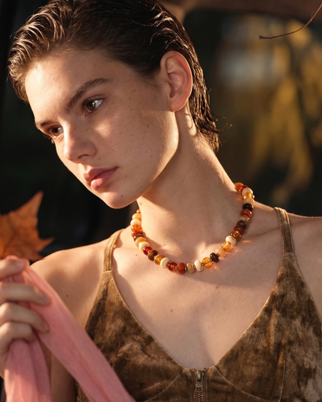 Kralenketting in Ambertinten